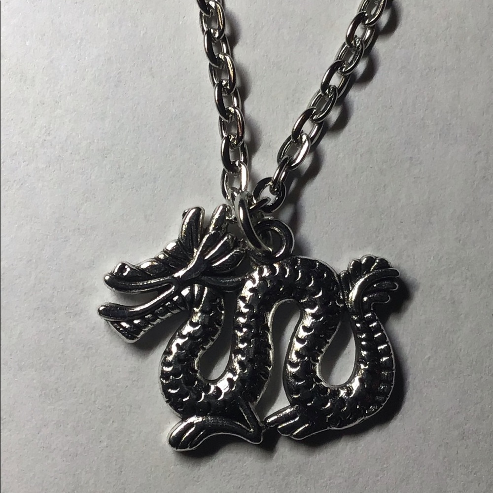 Dragon pendant necklace silver colored